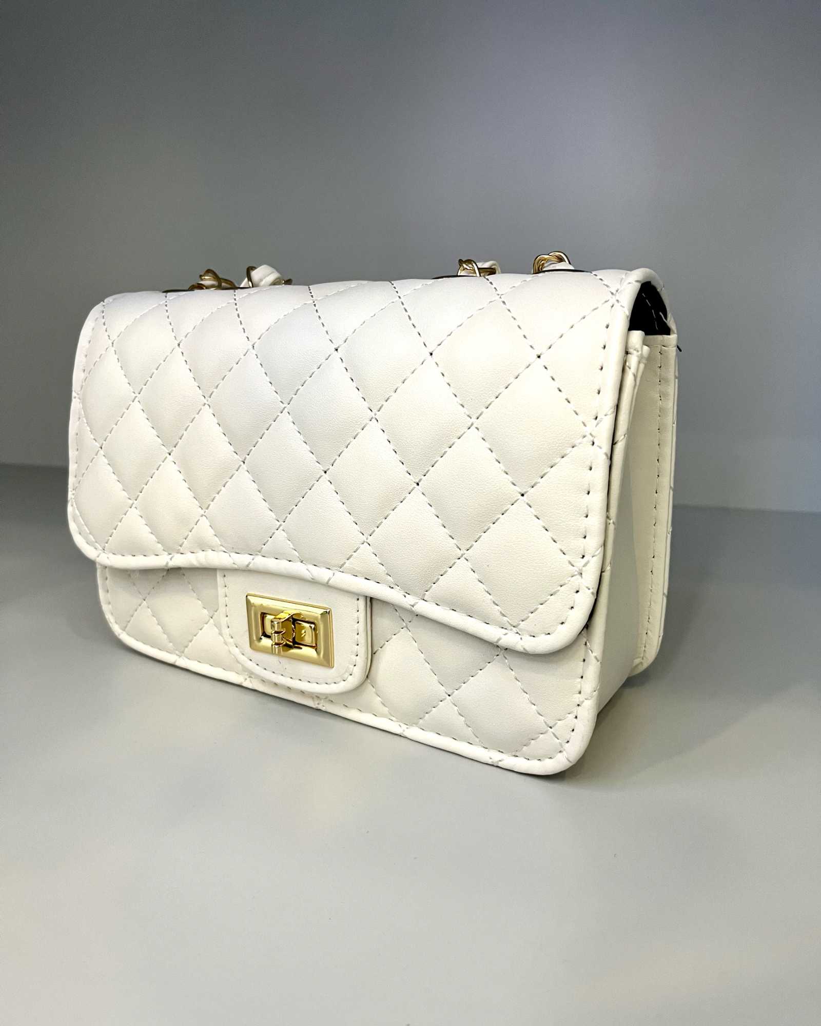 Borsa bianca con tracolla oro mondello store